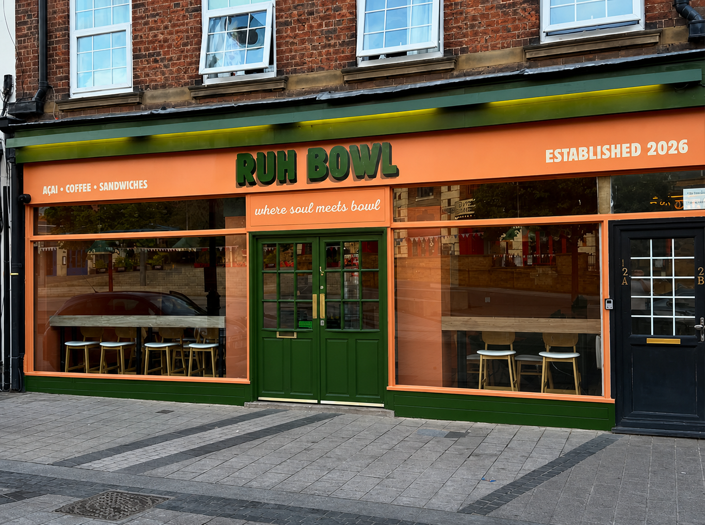 The orange and green Ruh Bowl storefront in Kettering
